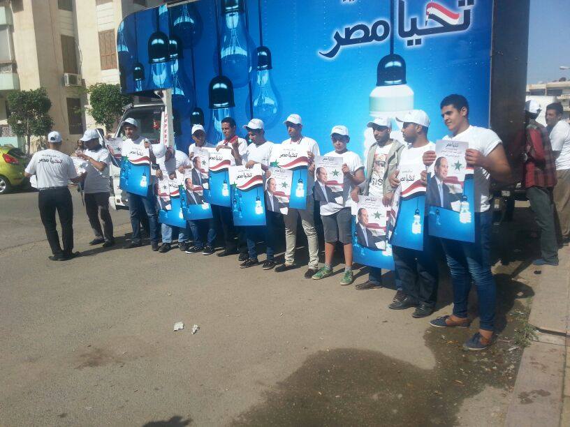 Elections commission criticizes Sisi campaign for distributing light bulbs
