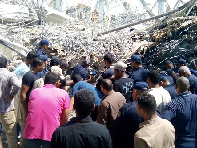 Textile workers killed in factory collapse, shot in labor protest