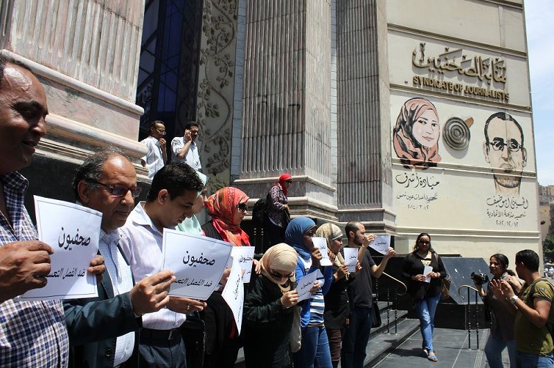 Journalists protest mass lay-offs, demand syndicate take action