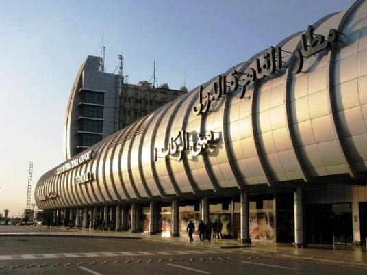 Wife of detained journalist banned from traveling to visit her son
