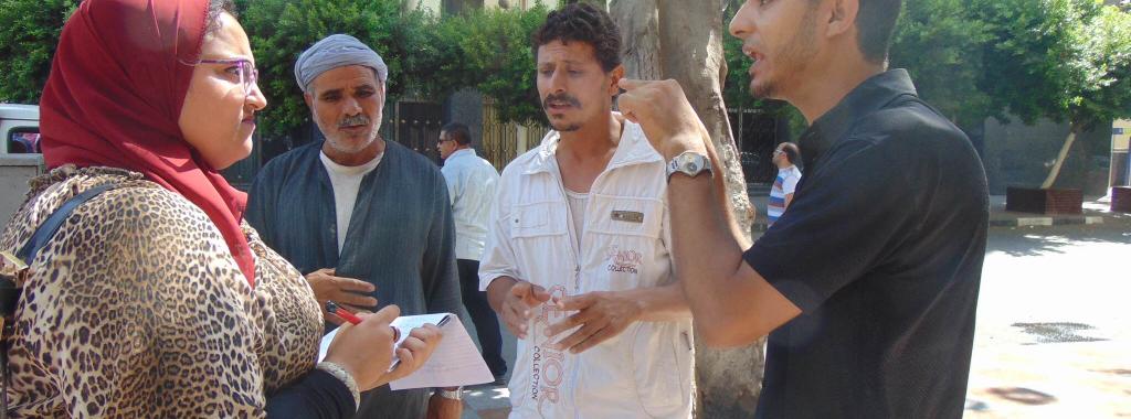 Coptic sectarian violence victims flee Minya and demand justice in front of Parliament