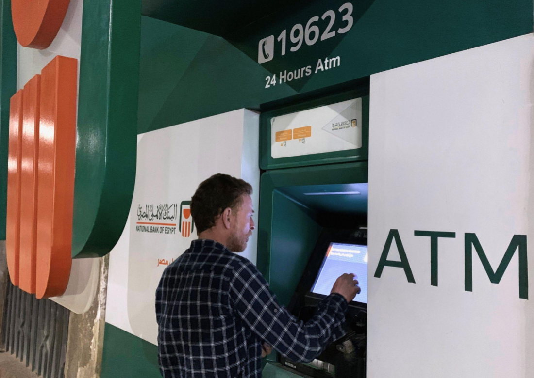 Amid liquidity crisis, 2 banks tighten limits on card withdrawals outside Egypt