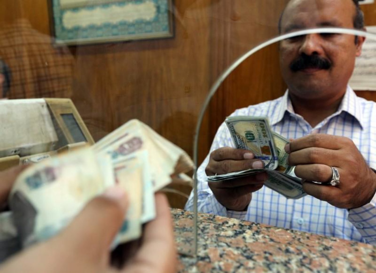 Dollar price falls in parallel markets relieving pressure on consumers but causing uncertainty for businesspeople, traders