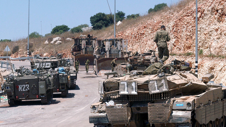 Fears of possible invasion grow as Israel amasses troops at Lebanese border