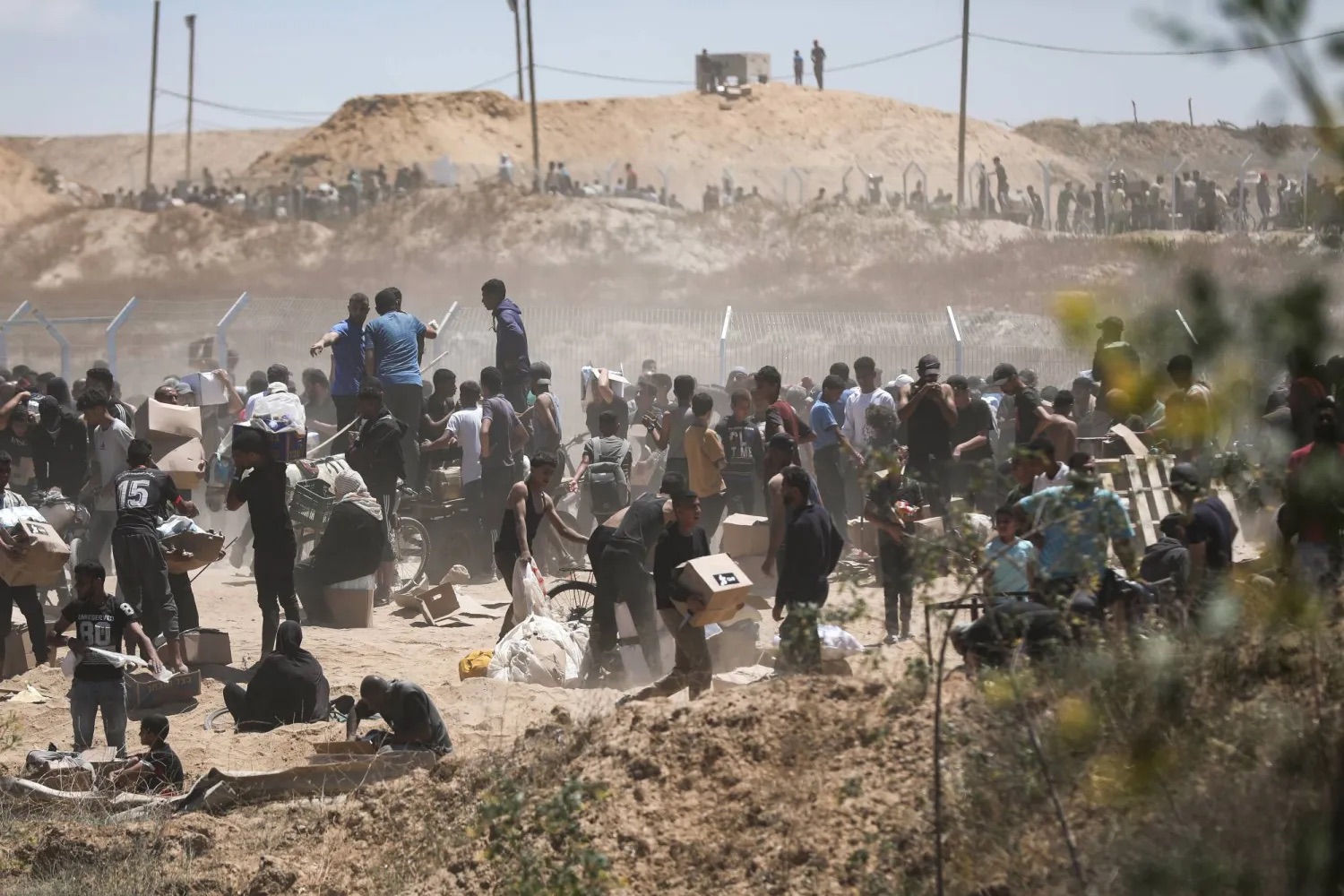 In replay of scenes in Rafah, Israeli forces open fire at aid seekers at securitized center in central Gaza